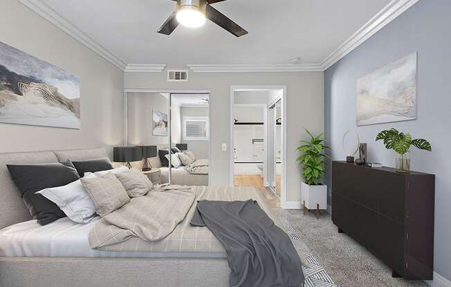 Large bedroom with ceiling fan.