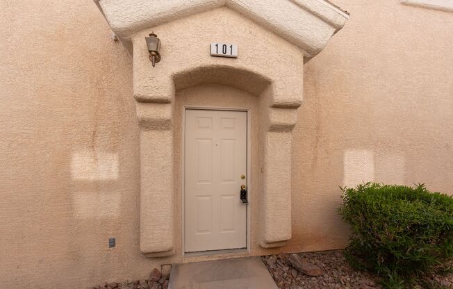 Two bedroom townhome with garage in gated Henderson community.