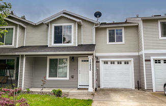 Spacious 4-Bedroom Townhome with Modern Features and Prime Location