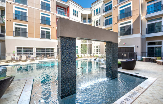 Waterford Market Apartments water art and pool view Apartments near Dallas, TX