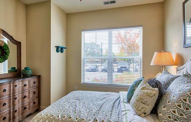 Bed and window at apartments in Virginia Beach NC