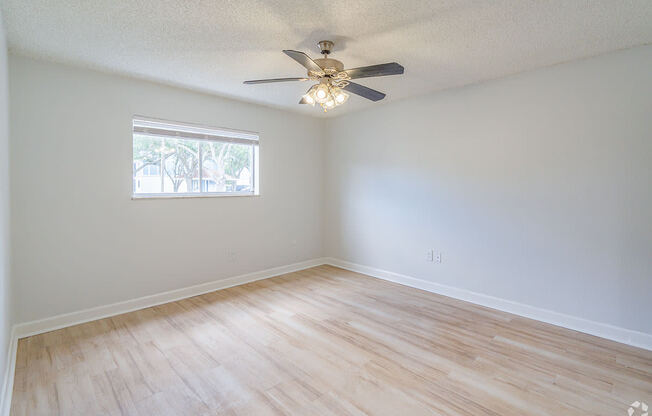 an empt Renovated Secondary Bedroom at Captiva Club Apartments at 4401 Club Captiva Drive in Tampa, FL 33615