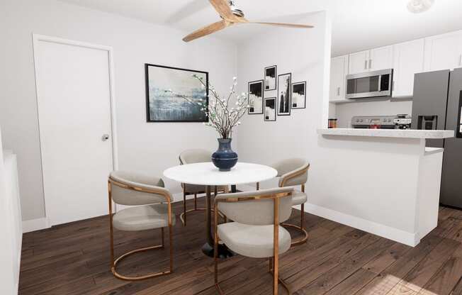 a dining room with a table and four chairs