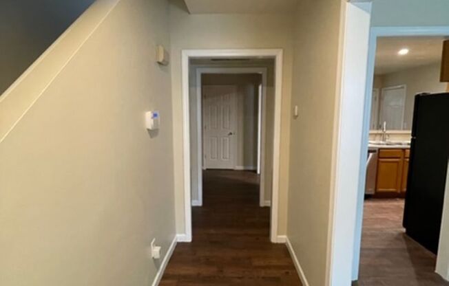Must see this 4 bedroom 2.5 bath townhouse with 1 car garage .