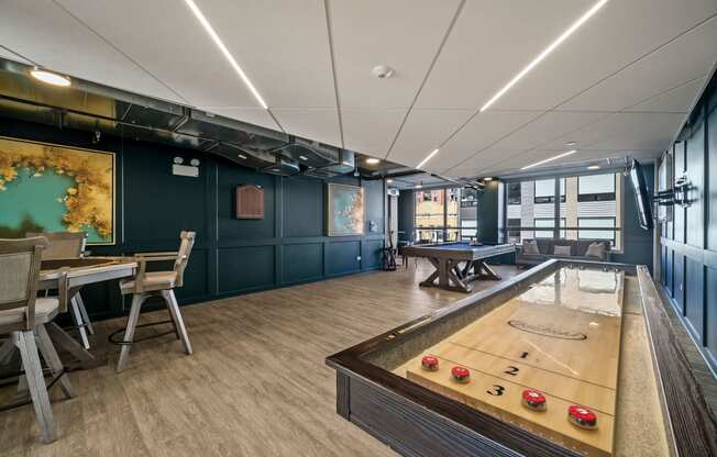 a games room with a ping pong table and a foosball table at Lakeview 3200 Apartments, Illinois, 60657