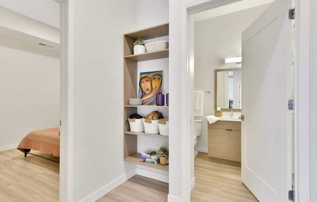 A bathroom with a towel on the floor.