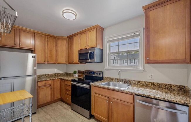 Spacious 1 + 1 Condo in quiet walk up Bldg.