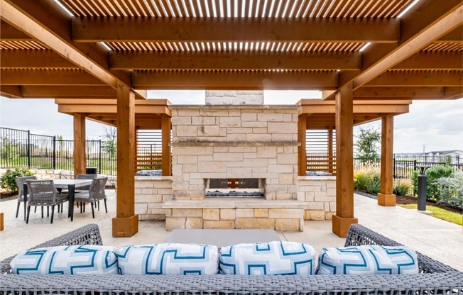 Outdoor Fireplace and Social Lounge Area at Reveal 54 Apartments