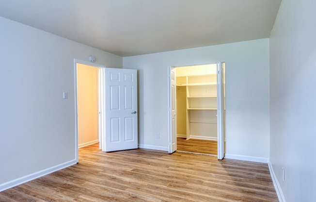 an empty room with a closet and an open door at Gates of West Bay in Norfolk, 23503