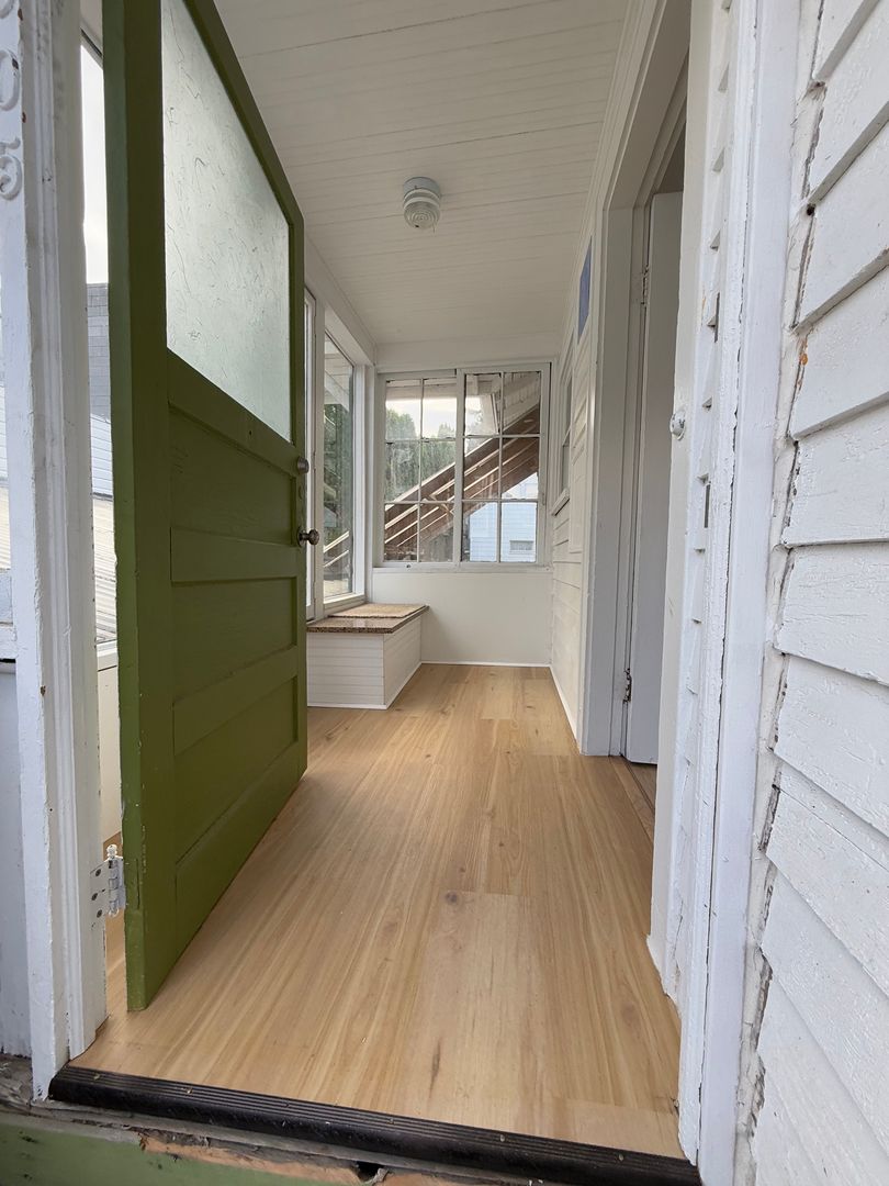 Completely renovated, university district, 2 bed, 2 bath.  hardwoods, bus line, walking to everything basement garage ample storage sliding barn door, beautifully renovated bathrooms, small yard,1 car garage. close to greenlake, Must see