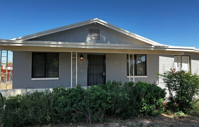 BEAUTIFULLY REMODELED 3 BEDROOM 1.5 BATHROOM HOME WITH A LARGE BACKYARD IN COOLIDGE