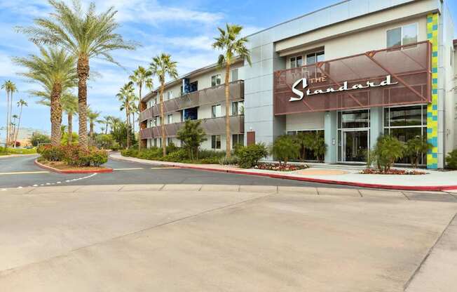 The Standard hotel has a parking lot in front of it.