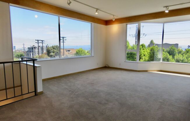 2 Story Condo with Parking, Views and Outdoor Space!