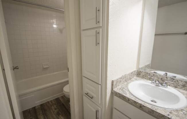 This is a photo of the bathroom of the 550 square foot 1 bedroom apartment at Canyon Creek Apartments in Dallas, TX