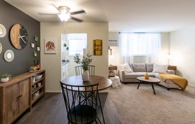 This is a picture of the dining area and living room in a 576 sq foot 1 bedroom, 1 bath apartment at Red Bank Reserve in the Madisonville neighborhood of Cincinnati, Ohio.