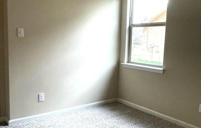 This beautiful one-story home is situated in Lasater Ranch, a sought-after neighborhood in Crowley, Texas.