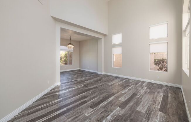 2 Story Summerlin Home with Refreshing Pool & Lush Landscaping