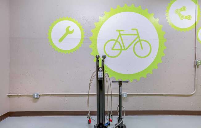 the wall is decorated with images of bicycles and tools