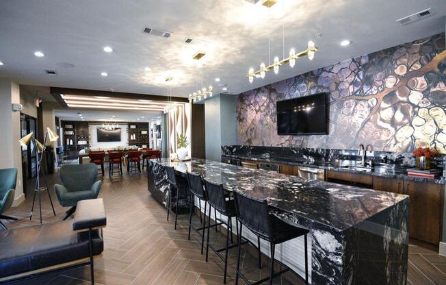 a bar with marble counter tops in a restaurant