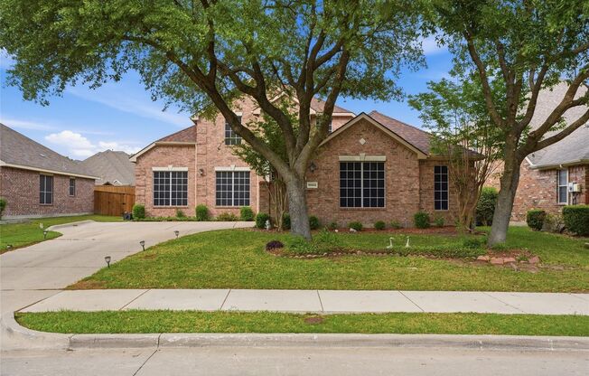 Tucked inside Rowlett's sought-after Waterview community