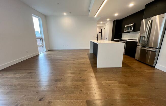 Stunning 2-Bed/2-Bath Condo with One-Car Garage and Rooftop Deck! Available NOW!