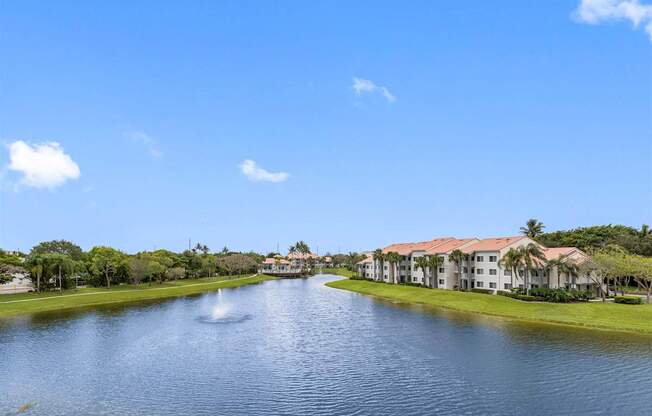 a view of a river with houses on the side of it