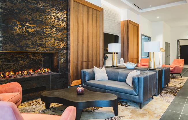 30th-floor lounge room with comfortable seating and fireplace.