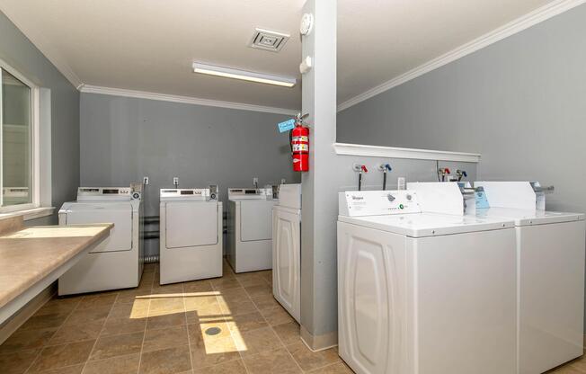 a kitchen with a tile floor