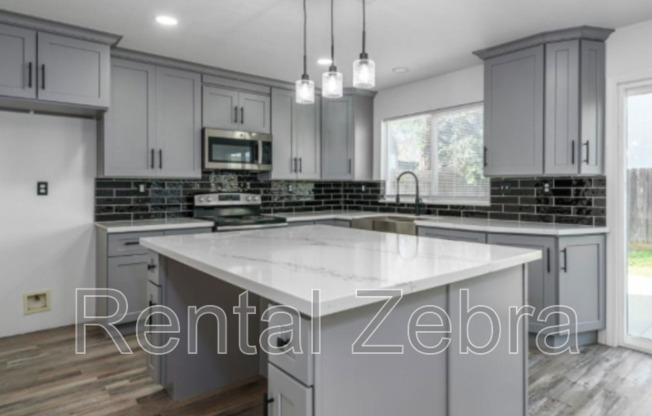 3785 COMPASS POINTE AVE