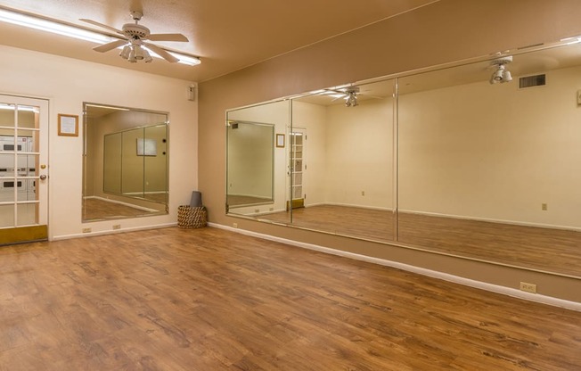 Canyon oaks spacious fitness room with ceiling fan