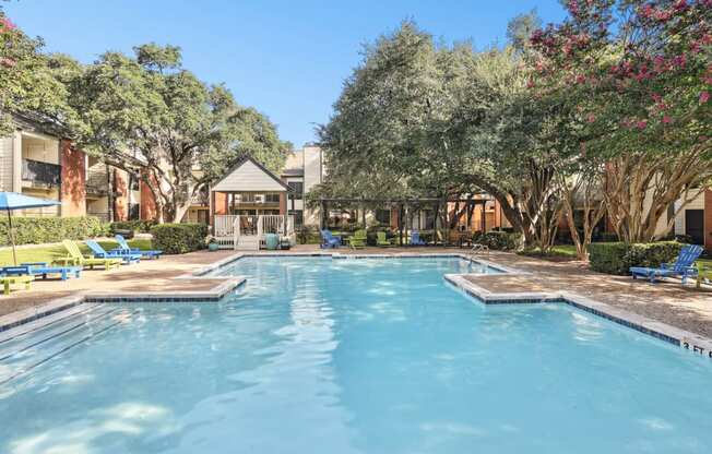 Sparkling swimming pool at Hunters Chase Apartments in Austin, TX