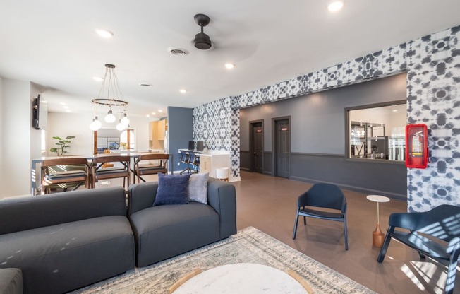 a living room and dining room with a couch and a table