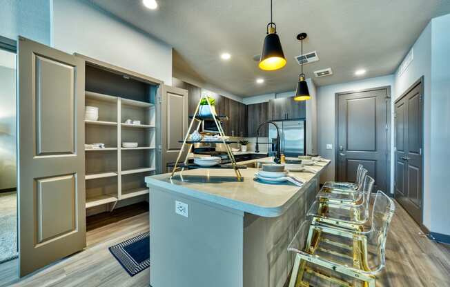 kitchen with island and pantry shelves at The Rey Downtown, Arizona