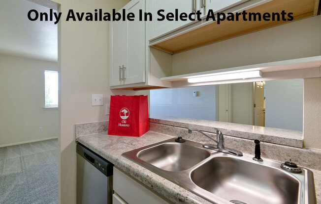 White Shaker Style Cabinets at Old Monterey Apartments in Springfield, MO