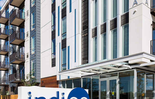 Indigo Monument Sign In Front Of Building