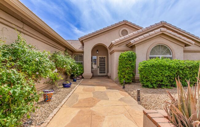 Furnished Goodyear home in this beautiful golf course community with tons of amenities!