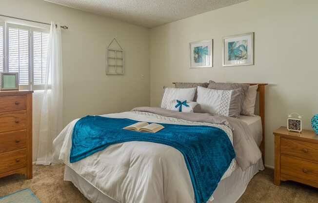Foothills bedroom with nice natural lighting and carpet flooring