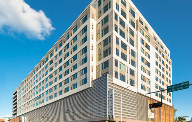 A large building with a flat roof and a lot of windows.