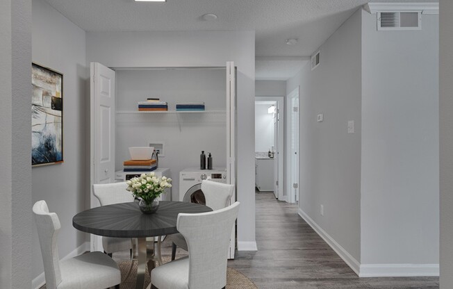 Step into modern living at Icon Downtown Durham, where sleek design meets comfort. This stylish dining area perfectly complements your lifestyle. Don’t miss out on a chance to elevate your days—schedule a tour today!