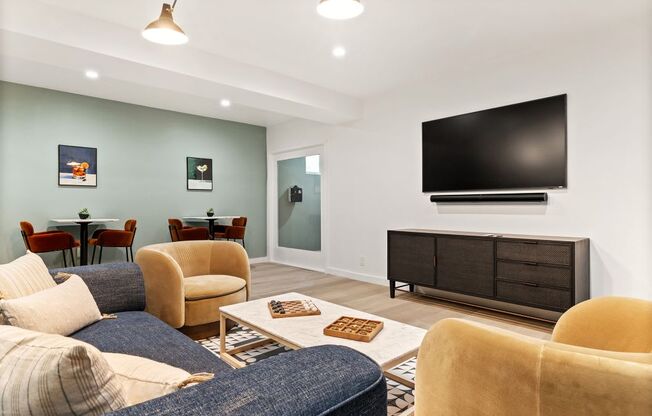 a living room with a couch and a television