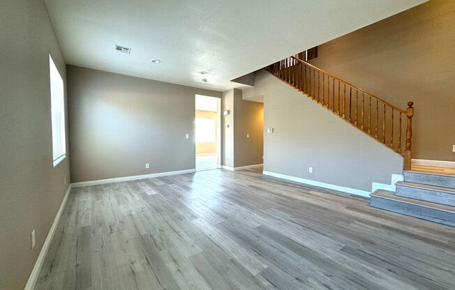 Beautifully upgraded 4 bedroom home with downstair bedroom, open living room and mini loft!