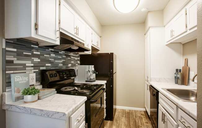 One Bed 618sqft Kitchen at River Oaks Apartments in Tucson