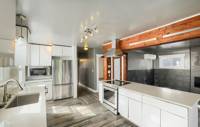 Amazing 3bed/4bath Home with 3 Additional Flex Rooms in University District!