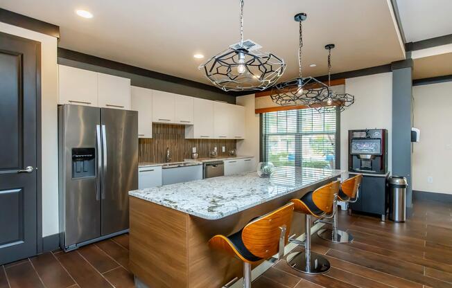 a kitchen with an island in the middle of a room