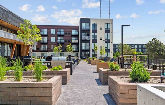 A modern building with a courtyard in front.