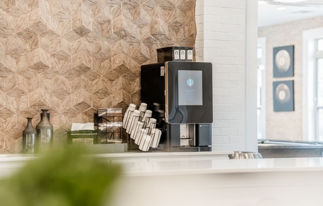a coffee machine sitting on a counter in a room
