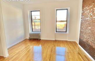 306 E 11 ST