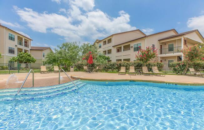 a house with a large pool of water