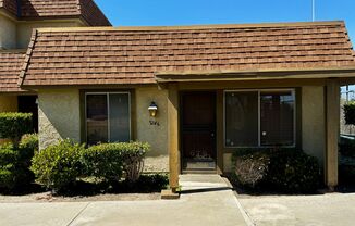 2/1 Townhome with 2 car attached garage & AC for Rent in La Palma!