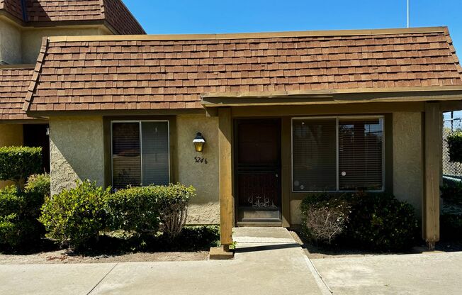 2/1 Townhome with 2 car attached garage & AC for Rent in La Palma!